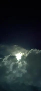 The appearance of the sky with beautiful clouds and the moon on a very quie.. Stock Photos