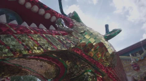 The Appearance of Sunlight due to the Head of the Mosaic Dragon. Slow Motion Stock Footage 66388923