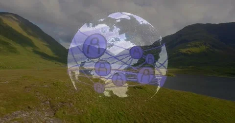 Appearing clear globe overlay rotating and pulsing user nodes over grassy Stock Footage 331005919