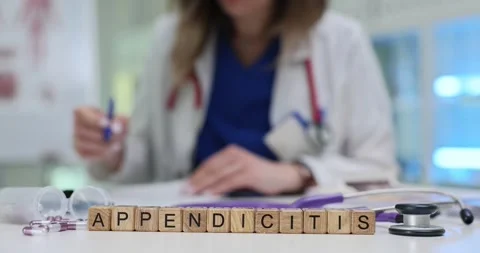 Appendicitis word built from cubes surrounded by tools and notes Stock Footage 314123893