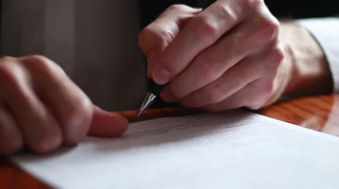 Appending signature on papers Stock Footage 63455220