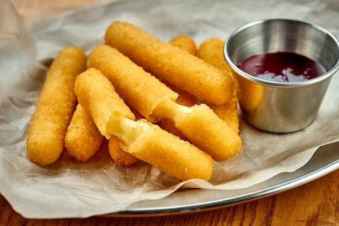 An appetizer for beer - breaded stick mozzarella fries. Close-up, selective f Foto stock