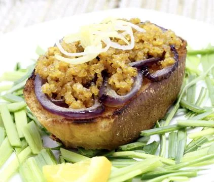Appetizer with fried fish roe Stock Photos