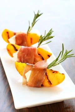 Appetizer with grilled peach Stock Photos