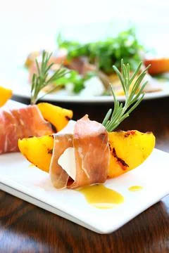 Appetizer with grilled peach Stock Photos