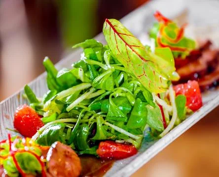Appetizer with herbs and meat 库存照片