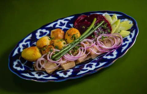 Appetizer, Herring with vodka. Stock Photos