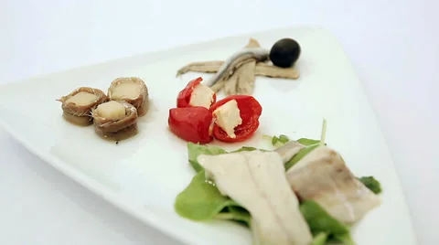 Appetizer of marinated fish with cheese and pepper. Closeup. HD shot with slider Stock Footage 39880470
