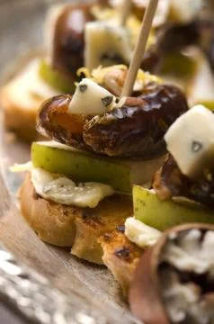 Appetizer Plate with Dactyl, Pecan nuts and Cheese Stock Photos