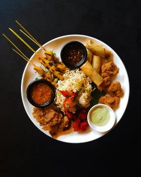 Appetizer platter on black background Stock Photos