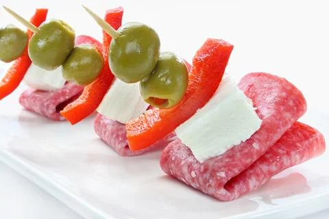 Appetizer with salami Stock Photos