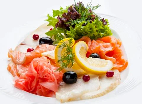 Appetizer of salted fish on white background Stock Photos