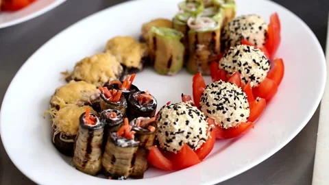 Appetizer snack in a plate prepared for the festive meal in the restaurant Stock Footage 98663452