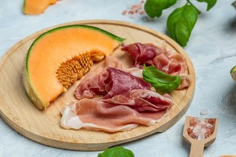 Appetizer with sweet melon and ham, dorblu stilton dairy product, blue chee.. Stock Photos