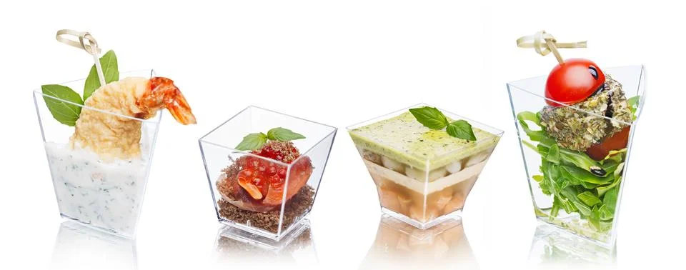 Appetizers in glasses Stock Photos