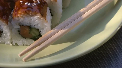 Appetizing amazing "Dragon" square sushi rolls with eel, salmon, cucumber, nori Stock-Footage 75198190