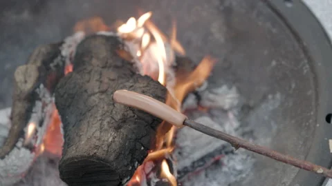 Appetizing and beautiful mix - Hot dogs, sausages, wieners fry and turn. Stock Footage 201621379