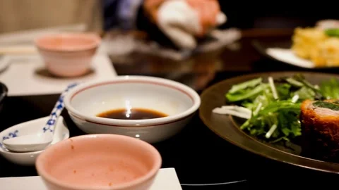 Appetizing Asian fusion dish featuring shrimp and Japanese toppings Stock Footage 335784322