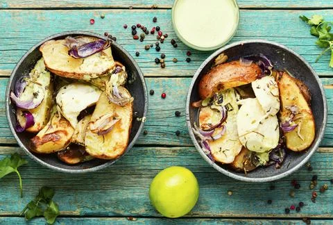 Appetizing baked potatoes Stock Photos