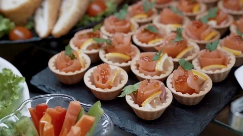 Appetizing baskets of snack red fish Stock Footage 126096428