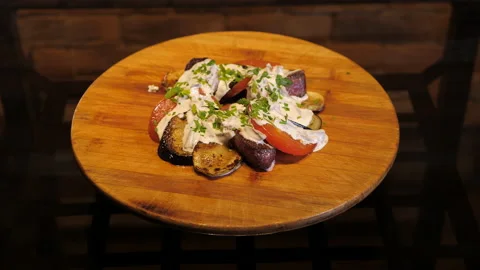 Appetizing beef tenderloin with grilled vegetables and cream sauce. Video stock 130974773
