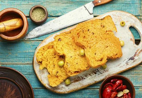Appetizing bread with sun dried tomatoes and olives Stock Photos