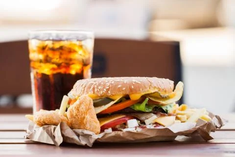 Appetizing burger and cold drink Stock Photos
