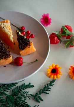 An appetizing cake slices with cherries Stock Photos