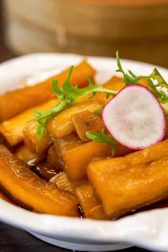 An appetizing cold dish, pickled radish in sauce Fotos de archivo