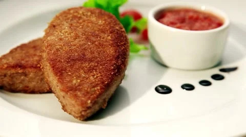  Appetizing cutlet on a white plate Video stock 64751389