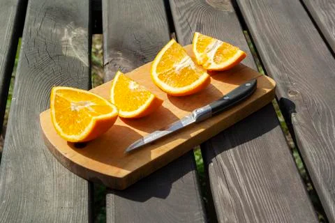 Appetizing cutted pieces of orange Stock Photos