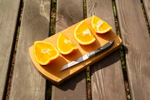 Appetizing cutted pieces of orange Stock Photos