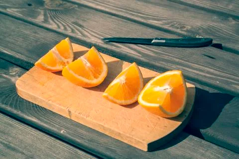 Appetizing cutted pieces of orange Stock Photos