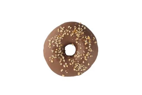 Appetizing donut in chocolate icing with nuts on a white background. Isolated Stock Photos