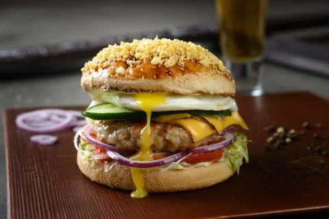 Appetizing egg burger Stock Photos
