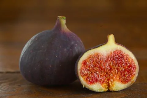 Appetizing figs on table Stock Photos