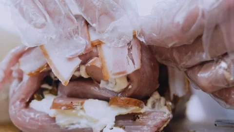 Appetizing finished dish: weaving bacon over the pork roll Stock Footage 342184790