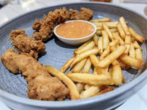 Appetizing Fish &amp; Chips Bites. Crunchy, flavorful, and mouthwatering, a per.. Stock Photos