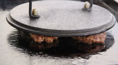 Appetizing fried beef patties on a grill pan Stock Footage 50179586