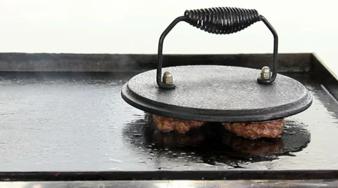 Appetizing fried beef patties on a grill pan Stock Footage 50179814