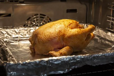 Appetizing fried chicken stuffed with rice from the oven Foto stock