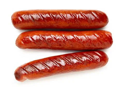Appetizing fried sausages close-up on a white isolated Stock Photos