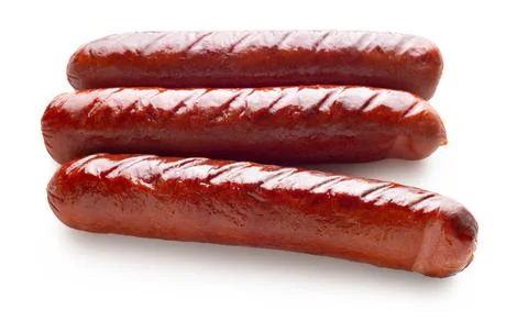 Appetizing fried sausages close-up on a white isolated Foto stock