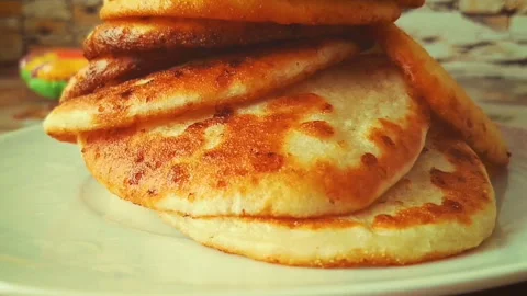 Appetizing fritters on a plate Stock Footage 85666329