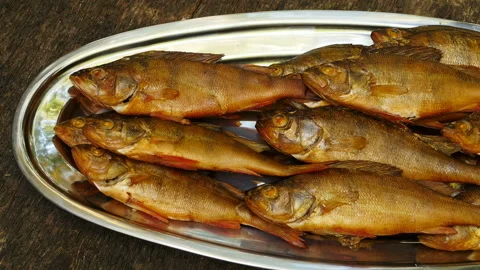 Appetizing golden smoked perch Stock Footage 164603532