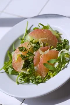 Appetizing grapefruit salad Stock Photos