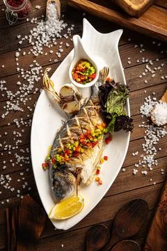 Appetizing grilled fish Stock Photos