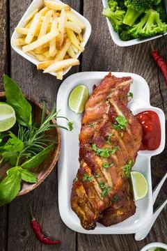 Appetizing grilled ribs Stock Photos
