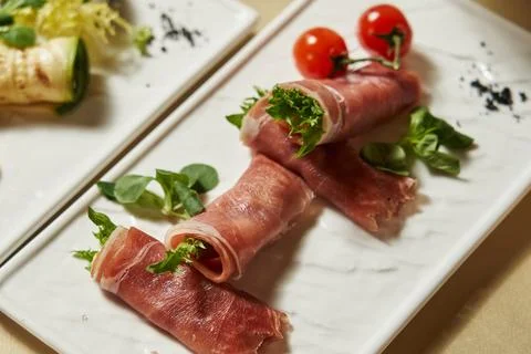 Appetizing ham rolls with stuffing. snack. buffet. antipasti. breakfast. snack Stock Photos