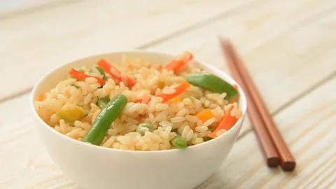 Appetizing healthy rice with vegetables Stock Footage 69149471